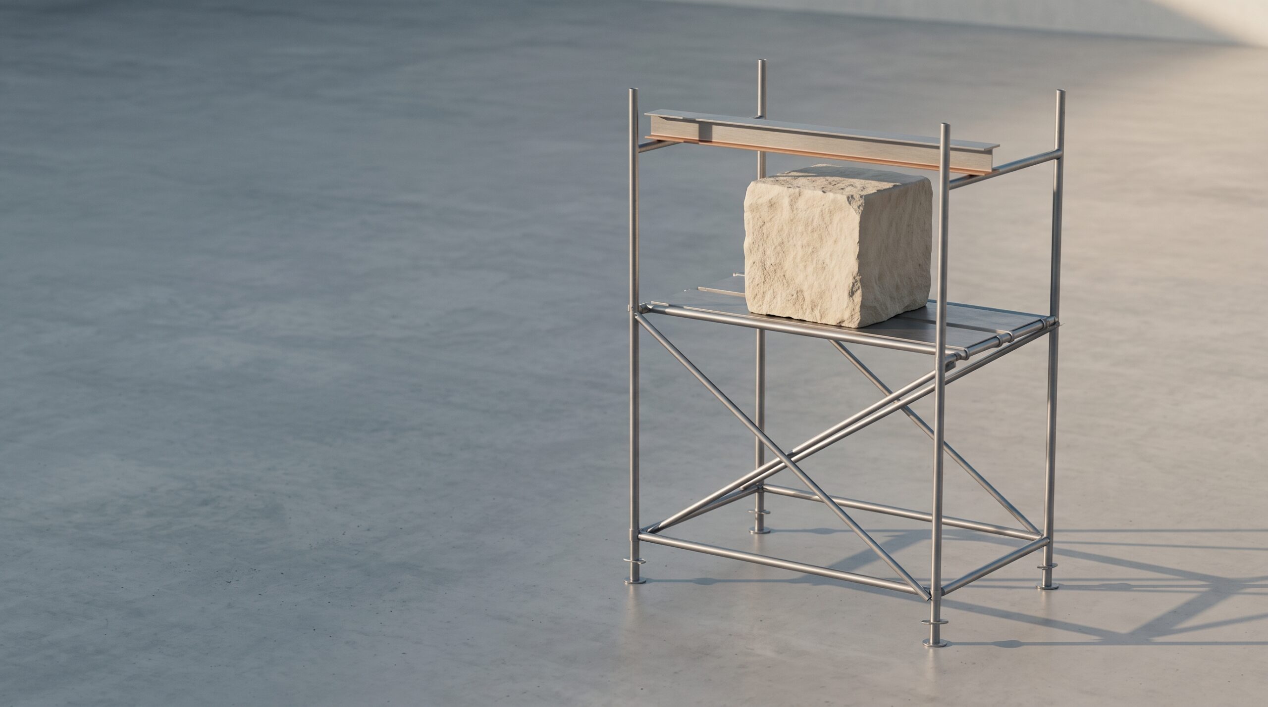 Pristine steel scaffolding supporting a solid block of pale stone on a concrete floor